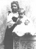 Elda holding her sister, Alice